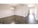 Large dining room area with hardwood-style floors and natural light at 6117 Arctic Cir, Indianapolis, IN 46237