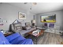Inviting living room featuring cozy gray walls, entertainment system, and comfortable seating, a perfect relaxation spot at 817 Hamilton St, Lebanon, IN 46052