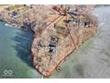 Aerial view of lakefront property showing outline of property lines at 18 Point Ln, Arcadia, IN 46030