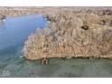 Aerial view of home and private dock on the lake at 18 Point Ln, Arcadia, IN 46030