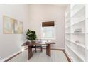 Bright office space with built-in bookshelves, perfect for working from home at 2056 Suda Dr, Carmel, IN 46280