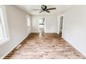 Open dining area featuring wood floors and ample natural light at 3926 Delaware St, Anderson, IN 46013
