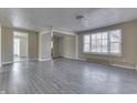 Spacious living room featuring neutral decor, new flooring, and ample natural light at 4159 N Ridgeview Dr, Indianapolis, IN 46226