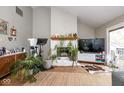 Bright living room with fireplace, vaulted ceilings, and stylish decor at 5629 Crittenden Ave, Indianapolis, IN 46220