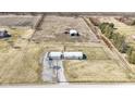 Overhead view of home with open land and outbuildings at 2668 S 600 W, Lebanon, IN 46052