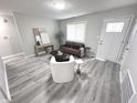 Bright living room boasts stylish furnishings and neutral tones at 7807 Inverness Dr, Indianapolis, IN 46237