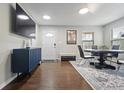 Open dining area with modern furniture and plenty of natural light at 12486 Schoolhouse Rd, Fishers, IN 46037