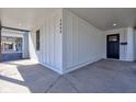 Covered porch with inset lighting leads to the front door at 1434 S Talbott St, Indianapolis, IN 46225