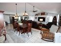 Open-concept living and dining areas with modern decor and ample natural light at 1939 Crystal Bay E Dr, Plainfield, IN 46168