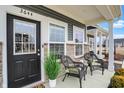 Inviting front porch with seating, perfect for relaxing and enjoying the neighborhood views at 3644 Thomas Jefferson St, Westfield, IN 46074