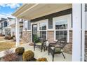 Cozy front porch featuring stylish seating and charming landscaping, creating a warm and inviting entrance at 3644 Thomas Jefferson St, Westfield, IN 46074