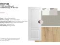Interior view showcasing the door, flooring, hardware, paint and trim at 1101 Knoll Ct, Greenwood, IN 46143