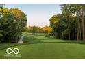 Beautiful golf course featuring lush green grass and green trees surrounding the landscape at 1558 Old Hickory Ln, Westfield, IN 46074