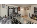 This elegant living room features unique furniture, decorations and lighting at 3219 E Maygrove Dr, Danville, IN 46122