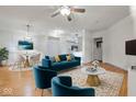 Bright, open living room with stylish decor, hardwood floors, and modern furnishings at 355 E Ohio E St # 206, Indianapolis, IN 46204