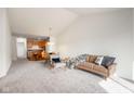 Open-concept living room with dining area and kitchen, perfect for entertaining at 3038 Wildcat Ln, Indianapolis, IN 46203