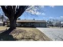 Inviting one-story house featuring a cozy front porch and an attached two-car garage at 4265 E Allison Rd, Camby, IN 46113