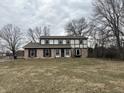 Two story home with brick and siding, dormer windows and brown shutters at 6797 W 900 N, McCordsville, IN 46055