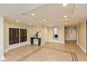 Bright lobby with mailboxes, modern decor, and neutral tile flooring with a patterned inlay at 802 N Meridian St # 205, Indianapolis, IN 46204