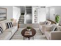 Bright living room featuring stylish furniture, plush rug, and plenty of space at 9435 Timber View Dr, Indianapolis, IN 46250