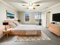Cozy bedroom with natural light, complemented by stylish furniture and calming decor at 976 Peppermint Ct, Greenfield, IN 46140