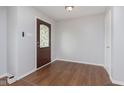 Bright entryway features wood floors and a decorative glass front door at 3113 Cassara Dr, Indianapolis, IN 46203