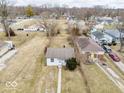 Overhead view of a single-story home nestled in a residential neighborhood during the winter season at 3145 Stuart St, Indianapolis, IN 46218