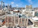 Stunning aerial view showcasing the city skyline and surrounding neighborhood at 430 N Park Ave # 304, Indianapolis, IN 46202