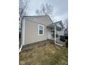 View of a cozy home featuring vinyl siding and a covered front porch at 620 W Madison St, Alexandria, IN 46001