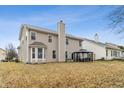 View of the home's rear exterior and backyard, showing the yard's size and the privacy it offers at 3322 Paisley Pointe, Whitestown, IN 46075