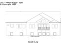 This is the rear elevation of the home featuring a balcony and multiple windows for natural light at 3604 Maple Ridge Dr, Columbus, IN 47201