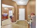 Inviting home entryway, with a white door and a view into the living area at 3844 Kilburn Ct, Indianapolis, IN 46228