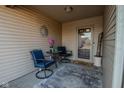 Cozy covered porch with seating and decorative accents, offering a welcoming entrance to the home at 8076 Captain Dr, Avon, IN 46123