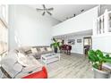 Spacious living room with high ceilings, modern decor, and lots of light at 9046 Glass Chimney Ln, Fishers, IN 46037