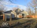 The home features a spacious backyard with a deck, perfect for outdoor entertaining at 929 Gilbert Ave, Indianapolis, IN 46227