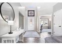 Bright entryway features tile flooring, a skylight and staircase at 11835 Bengals Dr, Fishers, IN 46037