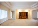Spacious living room with plush carpet and a built-in entertainment center at 1502 Heron Ridge Blvd, Greenwood, IN 46143