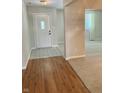 Inviting entryway with tile and hardwood flooring at 1103 Charleston Commons Dr, Anderson, IN 46012