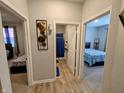Hallway view with bedrooms and bathrooms visible from the hallway at 11064 N Sashing Way, Monrovia, IN 46157