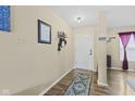 Inviting entryway with decorative rug and coat rack at 11614 Presidio Dr, Indianapolis, IN 46235