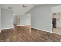 Bright living room with hardwood floors and open layout at 13841 Waywing Ct, Carmel, IN 46033