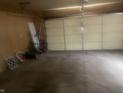 Attached garage offering ample space for parking and storage at 2346 Mayfair Dr, Indianapolis, IN 46260