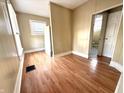 Cozy room with wood-look floors, window, fresh paint, and neutral colors offers comfortable living at 2821 E 13Th St, Indianapolis, IN 46201