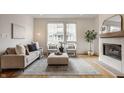 Elegant living room featuring a fireplace, neutral tones, and stylish decor for a welcoming atmosphere at 304 E 17Th St, Indianapolis, IN 46202