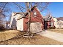 Beautiful brick home with a two-car garage and a well-manicured lawn at 9978 Niagara Dr, Fishers, IN 46037