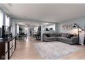 Spacious living room featuring light hardwood floors and an open concept design at 10154 Holly Berry Cir, Fishers, IN 46038