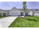 Charming house with a well-maintained lawn and inviting entrance, perfect for a Gathering at 16799 Imperial Ct, Fishers, IN 46040