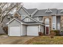 Exterior view of townhomes with attached garages at 3278 Oceanline E Dr, Indianapolis, IN 46214