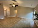 Bright and airy living room featuring hard surface floors and neutral wall colors at 3408 Village Dr, Anderson, IN 46011