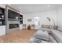 Modern living room featuring a fireplace, built-in shelves, and comfortable seating at 3550 N Illinois St, Indianapolis, IN 46208